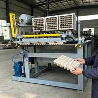 Machine d'emballage robuste pour plateaux à œufs, gain de place, avec ensacheuse hydraulique pour plateaux en carton et équipement de cerclage, modèle 2026 Gantry