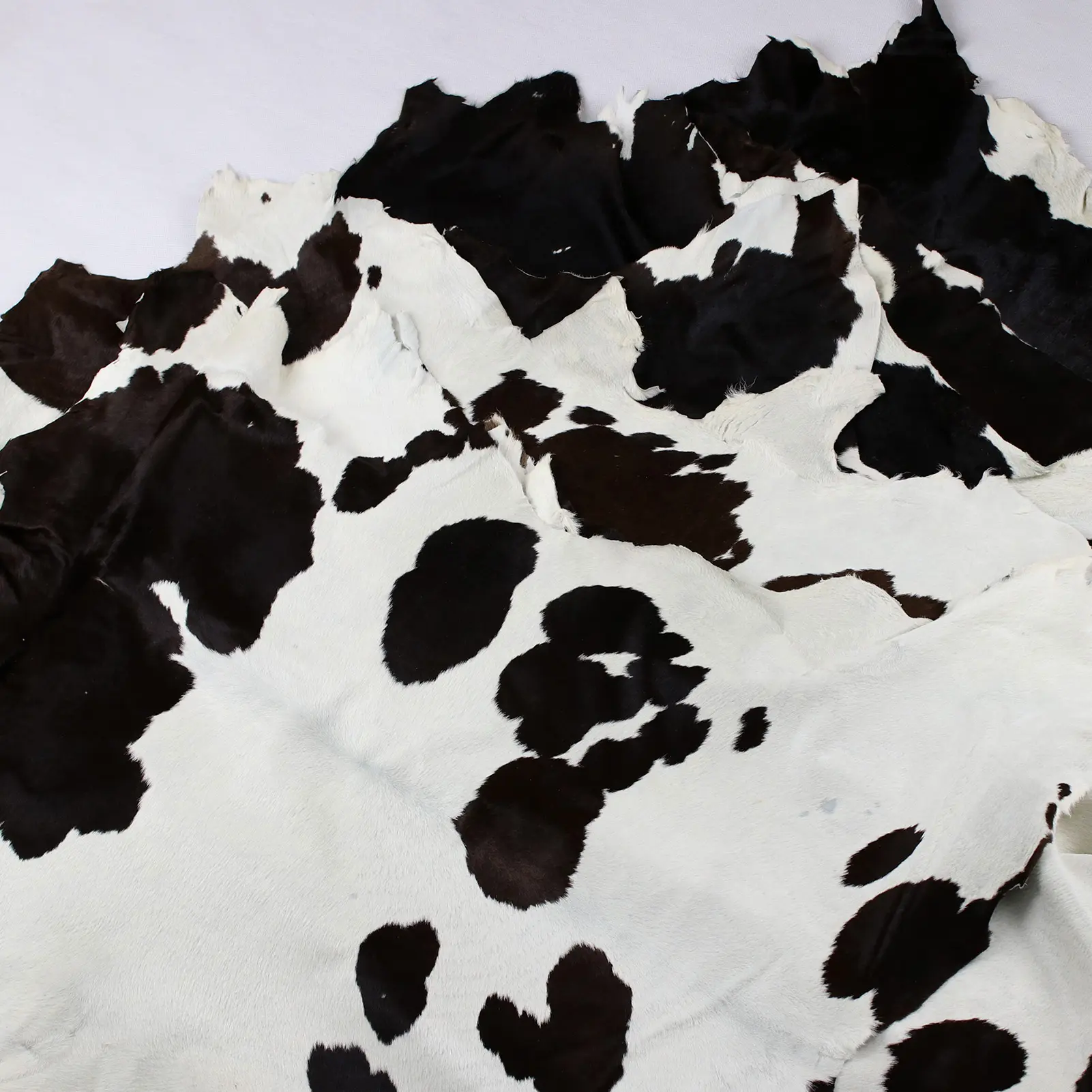 Calfskin de couro natural preto e branco