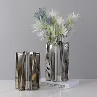 Altın gümüş Modern vazo oturma odası sundurma ev dekorasyonu paslanmaz çelik dalga eğrisi düğün çiçek düzenleme Metal vazo