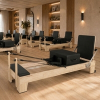 Reformer de Pilates en chêne rouge de luxe personnalisé, machine de Pilates en bois massif, directement de l'usine, pour distributeurs et grossistes