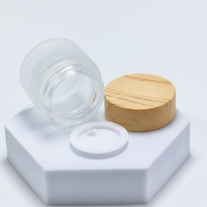 Custom Label Round <b>Glass</b> Jar 50g Cosmetic <b>Packaging</b> with Wooden Color Lid Frosted <b>Glass</b> Cosmetic Cream Jar - Product Image 3
