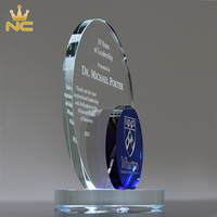 Plaque en cristal ronde personnalisée pour récompense de leadership avec base ovale