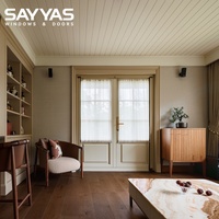 Ventana Abatible de Madera Revestida de Aluminio W-FL95-IW Personalizada Sayyas con Relleno de Gas Argón y Diseño de Marco con Rotura de Puente Térmico
