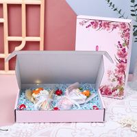 Boîte cadeau rose avec impression de logo personnalisé Boîte d'expédition postale en carton ondulé avec impression de colis postal