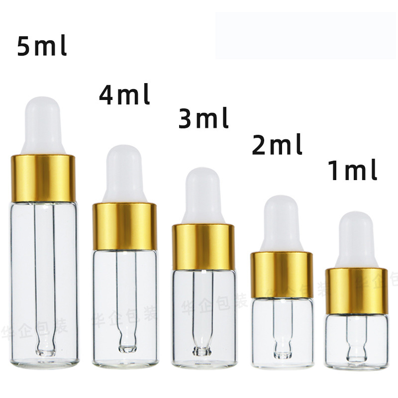 Clear bottle +gold & white dropper