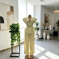 Ensemble décontracté deux pièces pour femme, style européen et américain, élégant pour le bureau, couleur unie, haut sans manches et pantalon large ajusté
