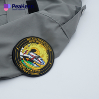 PeaKeen personnalisé gaufré à repasser sur caoutchouc souple PVC étiquette de vêtement patch en caoutchouc vêtements vêtements caoutchouc Logo 3D Silicone PVC Logo