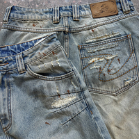 Vente en gros de pantalons en denim délavés avec éclaboussures de peinture délavée pour hommes, pantalons évasés streetwear à jambes larges personnalisés pour hommes