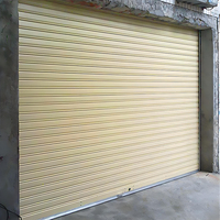 Porte à enroulement manuelle silencieuse pour garages, entrepôts et fermes