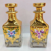 Botol parfum tampilan penjualan panas pola bunga lukisan emas klasik bentuk persegi ukiran UV mewah 150ml