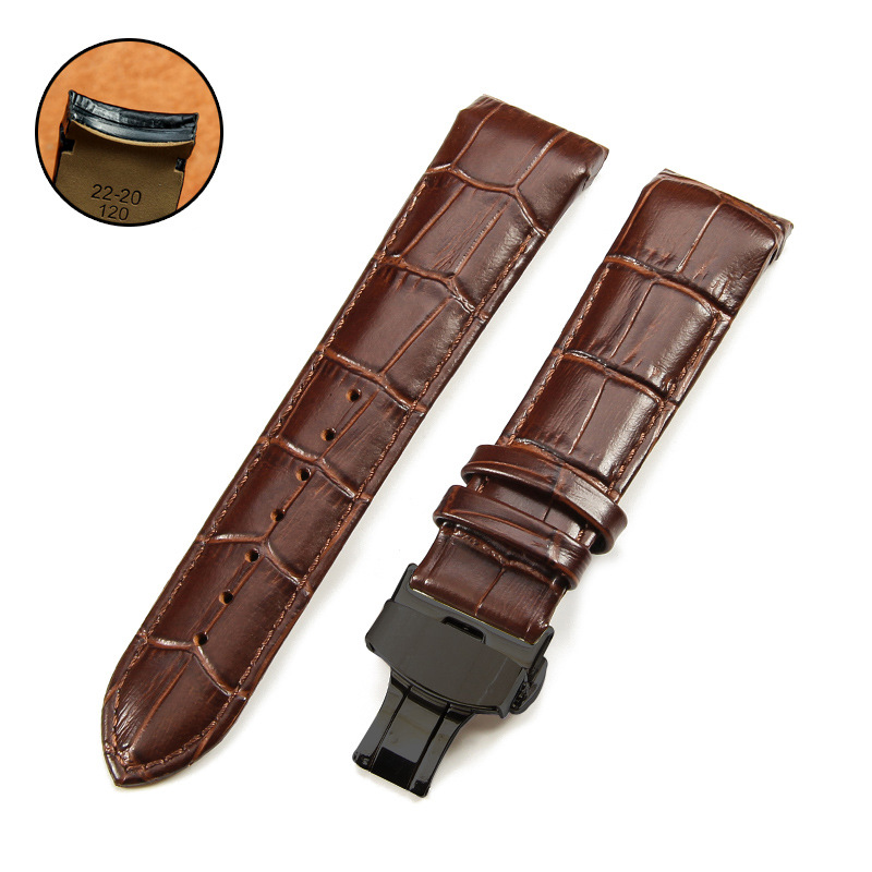 Brown and black button