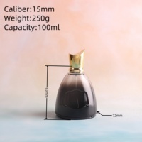 Flacon de parfum de luxe 100 ml avec pulvérisateur à pompe en verre rond unique estampé or sérigraphié et diffuseur à bâtonnets