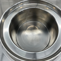 Équipement de cuisson professionnel : Cuisinière à induction double wok à queue unique pour cuisines ouvertes, idéale pour les restaurants et la préparation de soupes et de sautés.