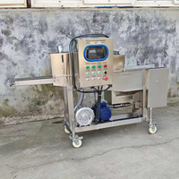 Machine à enrober les aliments de qualité alimentaire pour le pain, la viande de poisson, les filets de poulet, les schnitzels et les filets de porc, type cascade