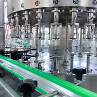Remplisseuse automatique électrique rotative contrôlée par PLC pour bouteilles en verre de 200 ml avec certification CE pour les boissons moussantes