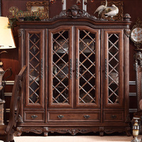 Ensemble de meubles de salle à manger classiques européens de luxe avec table ronde en bois massif, chaises rembourrées et détails sculptés à la main