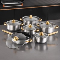 Ensemble de 12 ustensiles de cuisine antiadhésifs en acier inoxydable avec poignées dorées, couvercles en verre, compatibles induction, style moderne et minimaliste