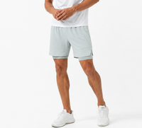 Shorts de course 2-en-1 pour hommes à taille élastique, poches latérales, séchage rapide, respirants, avec doublure intérieure personnalisable OEM pour la gym, le fitness et l'entraînement sportif