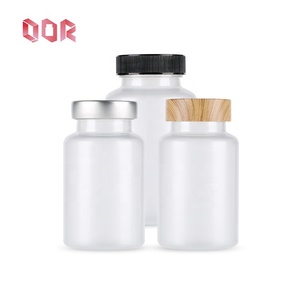 Capsule givrée pour comprimés Vitamine PET 600ml Bouteille de qualité alimentaire avec couleur personnalisée avec ligne de bois Vis métallique Bouchon de conception personnalisée - Product Image 1