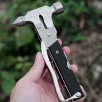 Nouvel outil multifonction de poche, marteau, pince, outil d'évacuation d'urgence en acier, équipement de survie en camping avec couteau utilitaire et scie