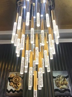Lustre moderne contemporain en cristal doré en spirale suspendu à LED pour long escalier de villa