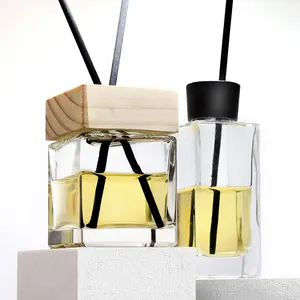 Square glass 100ml 200ml home decoration car fragrance diffuser essential oil bottle with rattan dried flowers