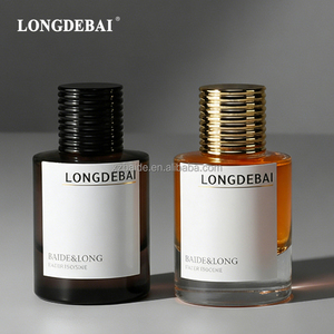 Wholesale <b>Empty</b> Cylinder Perfume <b>Spray</b> <b>Bottle</b> Clear Crimp Round 30ml 50ml 100ml Glass Perfume <b>Bottle</b> with Ribbed Gold Black Cap - Product Image 1