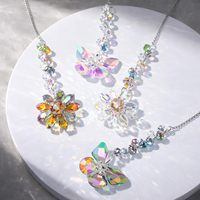 Lot de 4 pendentifs prisme arc-en-ciel en cristal K9, attrape-soleil en cristal papillon et fleur, ornement suspendu pour décoration
