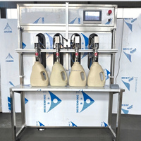Machine de remplissage semi-automatique à piston à quatre têtes pour détergent à lessive en bouteille et en fût, désinfectant pour les mains