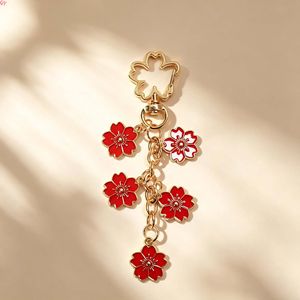 QQ New Enamel Flower <b>Keychain</b> Pendant Cherry Blossom <b>Keychain</b> High-end Design Key Ring Wholesale in Stock - Product Image 3