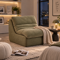 Canapé compact vert en chenille, une place, dossier ergonomique profilé, rembourrage moelleux, base antidérapante, emballage sous vide compressé