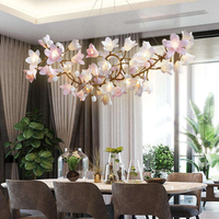 Lustre suspendu moderne en cuivre pour salon, salle à manger et escalier, avec motif floral décoratif et éclairage LED