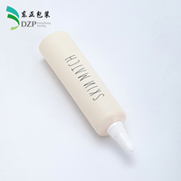 Tube cosmétique 19 mm en PE vide avec bouchon à vis, surface brillante, impression de logo personnalisée pour crème pour les yeux, fard à paupières, rouge à lèvres, sérum