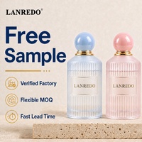 En stock, faible MOQ, flacon de parfum vide de haute qualité, pas cher, 30ml 50ml 100ml, flacon de parfum transparent bleu rose rayé avec bouchon à bille