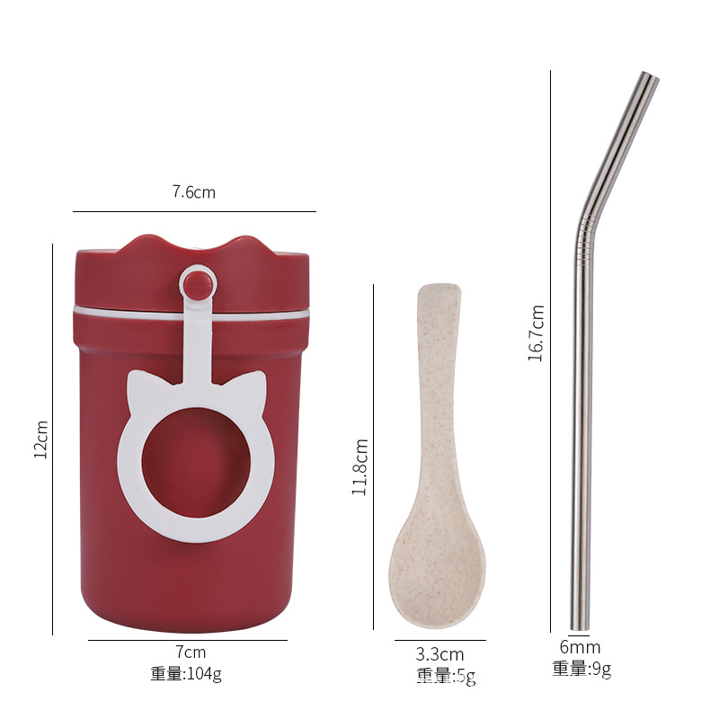 red cup with spoon and straw