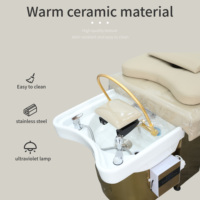 Lit de massage de luxe personnalisé avec cadre en acier inoxydable doré, cuir PU ergonomique et bassin en céramique pour salon et spa