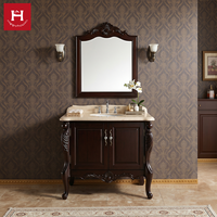 Meuble-lavabo double vasque en bois massif de style américain traditionnel Happy Houses, avec armoire sculptée et comptoir en marbre, idéal pour villas et hôtels