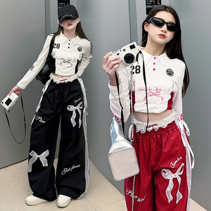Ensemble Fille Printemps 2025 Nouvelle Édition Coréenne Haut en Dentelle à Nœud avec Cordon Intégré et Pantalon Américain à Jambes Larges pour Enfants Moyens et Grands - Product Image 1