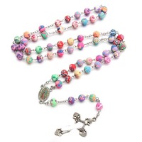 Collier chapelet en perles d'argile rondes colorées de haute qualité, avec croix, pour la vente en gros