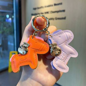 Fashion Leather Pony Pendant Keychain Charm Women Bag Pendant <b>Key</b> <b>Chains</b> Creative Lucky Horseback Money Bag Accessories Keyring - Product Image 3