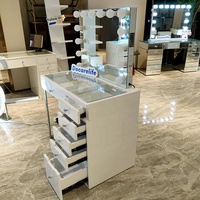Docarelife Stock aux États-Unis Coiffeuse BT moderne pour chambre à coucher avec miroir éclairé à ampoules et plateau en verre