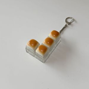 Juguete Antiestrés KADA Original Caramel Bread Button, Colgante para Mochila, Juguete de Dedo para Oficina - Product Image 3