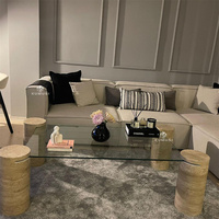 Table basse en verre cylindre en travertin