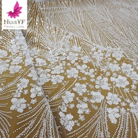 Tissu de dentelle brodée de fleurs blanches pures de très haute densité de qualité supérieure pour mariage HY1782-2