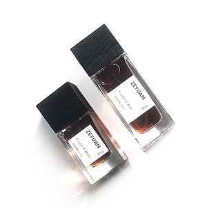 Botella de Spray de vidrio de Perfume de fondo grueso de crimpado transparente cuadrado plano de 100ml de alta calidad con tapa de madera negra - Product Image 1