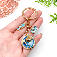 Porte-clés pour femme 2026, thème océan, avec pendentif coquillage et étoile de mer en alliage plaqué coloré