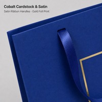 Ensemble de sacs de shopping de luxe bleu cobalt personnalisés avec nœuds en ruban de satin et impression dorée, vente en gros directe usine pour les magasins de détail et les cadeaux