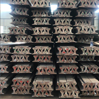 S26 60E1 rel kereta api rel kereta api baja karbon kualitas bagus ASTM R60E 55Q 38kg 43kg 60kg rel kereta api berat dijual