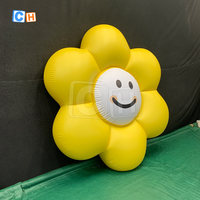 Ballon géant gonflable à pétales jaunes pour la décoration de l'extérieur avec visage souriant
