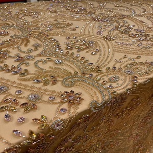 Tissu en dentelle brodé de perles de cristal haut de gamme en gros pour robes de mariée, robes de soirée et vêtements de mode – Fourniture textile - Product Image 1